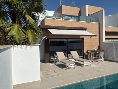 South-facing semi-detached villa in Algorfa with private pool, roof garden and modern design on La Finca Golf resort