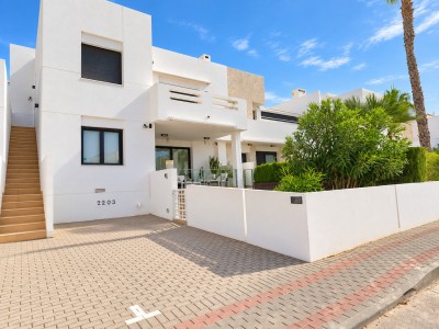 Ground-floor 2-bedroom apartment for sale in Algorfa at La Finca Golf resort with communal pool