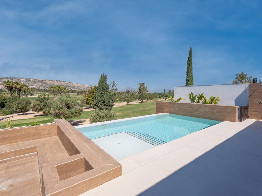 Newly built luxury villa on golf course front line in Algorfa with infinity pool and rooftop terrace