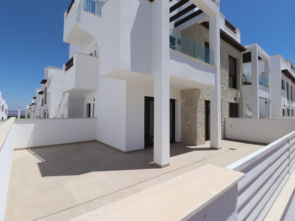 Key-ready 3-bedroom ground floor apartment with private tiled garden in Orihuela Costa