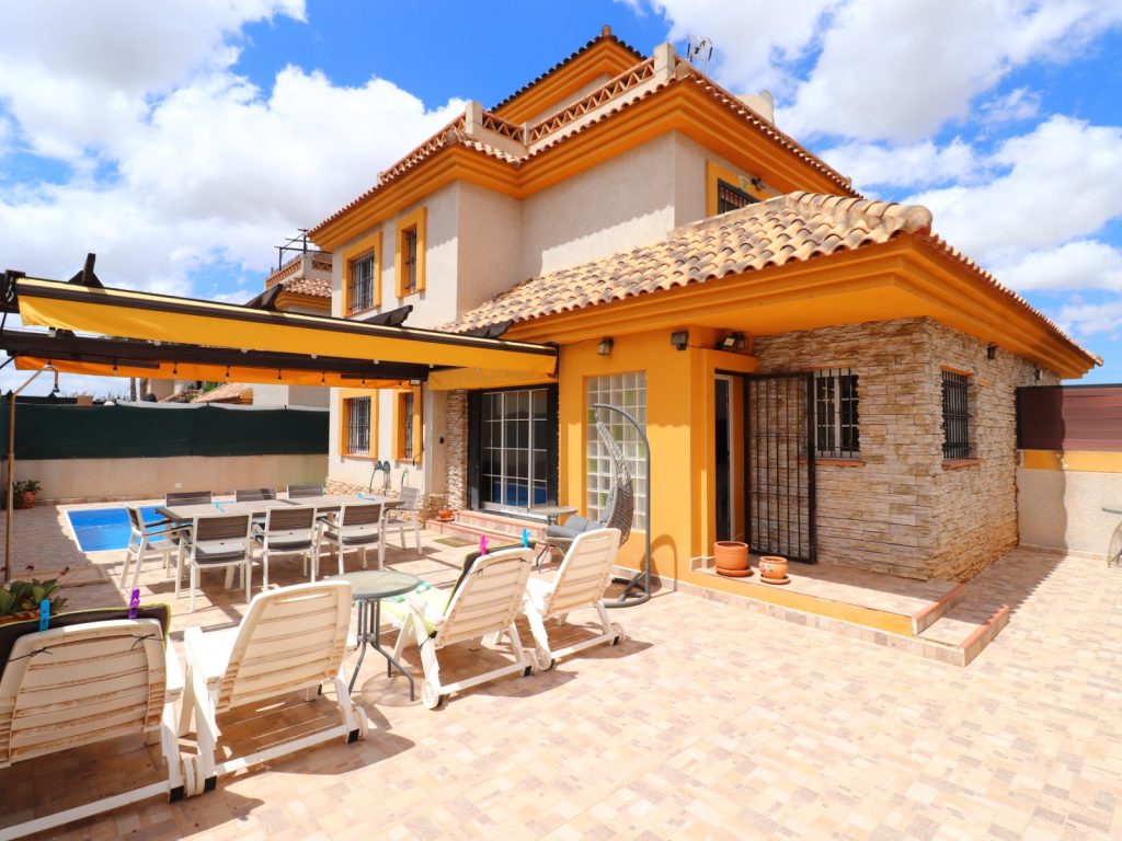 East-facing semi-detached villa in Los Montesinos with private pool, solarium and salt lake views, La Herrada